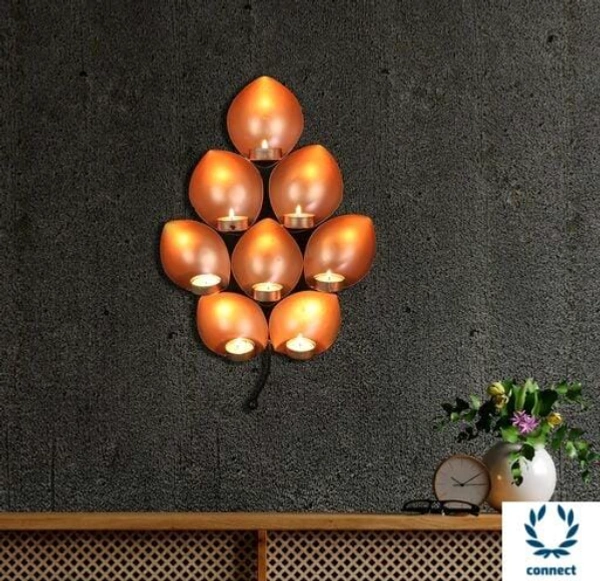 Decorative Leaf Eye Shaped Iron Wall Sconce Hanging Holder For Home Decors in this light lends a touch of tradition to your home decor - Metal , Tea Light Candle Holder, Pack of1